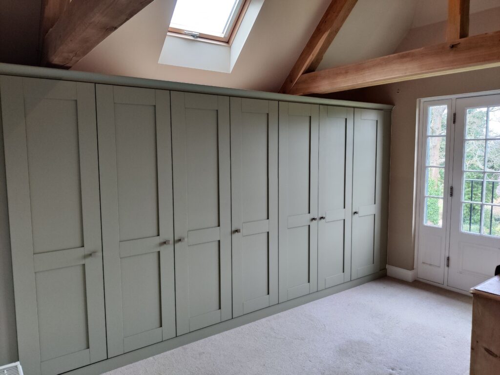 green shaker style fitted wardrobe