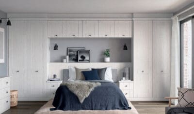 fitted wardrobes and over bed cupboards with bedsides