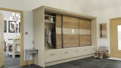 Champagne coloured fitted storage in a hallway